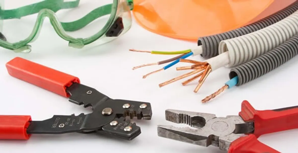 Electrical wiring repair with professional tools and safety equipment in Denver, CO